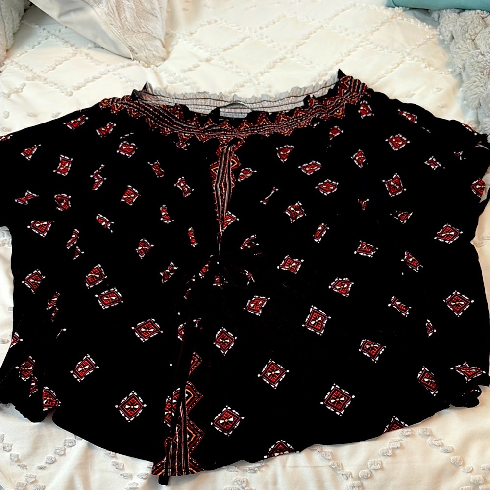 Colleen Lopez off the shoulder blouse with Doman sleeves.